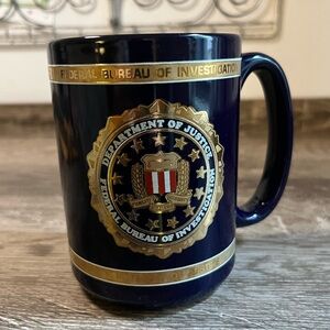 FBI Coffee Mug, never used. Gold embossing. FBI seal, department of justice